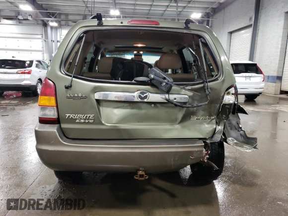 2002 Mazda Tribute LX with VIN 4F2CU08192KM29966, listed as a Copart auction lot 79458124 with 186,406 mi miles and Salvage Title. Bid and sale history available at carsss.com. Image 6.