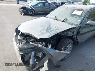 2004 Cadillac DeVille DHS z VIN 1G6KE57Y74U119605, wystawiony jako IAAI lot #40555057 z przebiegiem Nie podano mil oraz . Historia ofert i sprzedaży dostępna na DreamBid. Obrazek 6.