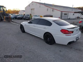 2015 BMW 6 Series 640i with VIN WBA6A0C54FGB53785, listed as a IAAI auction lot 40612020 with 67,524 mi miles and . Bid and sale history available at DreamBid. Image 3.