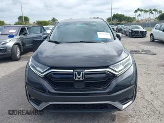 2021 Honda CR-V Touring with VIN 2HKRW1H91MH410751, listed as a IAAI auction lot 41286168 with 56,314 mi miles. Bid and sale history available at carsss.com. Image 6.