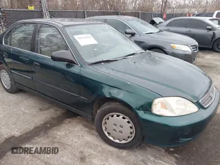 2000 Honda Civic LX with VIN 1HGEJ6673YL069805, listed as a IAAI auction lot 41511192 with 80,097 mi miles. Bid and sale history available at carsss.com. Image 1.
