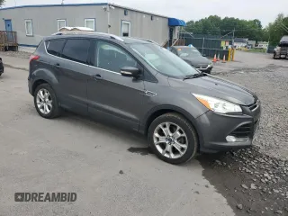 2016 Ford Escape Titanium with VIN 1FMCU9J90GUA01974, listed as a Copart auction lot 60376265 with 177,384 mi miles and Salvage title. Bid and sale history available at DreamBid. Image 4.