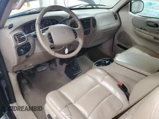 2002 Ford F-150 XL with VIN 1FTRX18L62NA69837, listed as a Copart auction lot 61581935 with 130,078 mi miles and Salvage title. Bid and sale history available at DreamBid. Image 8.