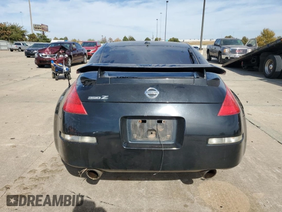 2007 Nissan 350Z with VIN JN1BZ34D97M504887, listed as a Copart auction lot 77140104 with 115,128 mi miles and Salvage Title. Bid and sale history available at DreamBid. Image 6.