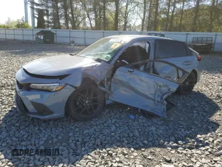2023 Honda Civic Sport z VIN 19XFL2H85PE004313, wystawiony jako Copart lot #54268555 z przebiegiem Nie podano mil oraz Szkoda całkowita • Salvage title. Historia ofert i sprzedaży dostępna na DreamBid. Obrazek 1.