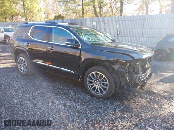 2020 GMC Acadia Denali with VIN 1GKKNXLS5LZ186171, listed as a IAAI auction lot 41205658 with 71,800 mi miles. Bid and sale history available at carsss.com. Image 1.