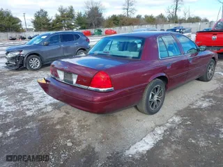 2004 Ford Crown Victoria Standard with VIN 2FAFP73W74X150232, listed as a IAAI auction lot 41277271 with 146,518 mi miles. Bid and sale history available at carsss.com. Image 4.