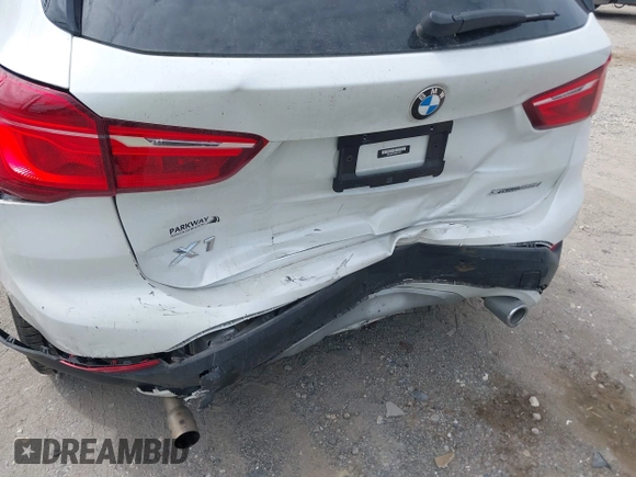 2021 BMW X1 xDrive28i with VIN WBXJG9C07M5U21337, listed as a IAAI auction lot 42590859 with 35,934 mi miles and . Bid and sale history available at DreamBid. Image 6.