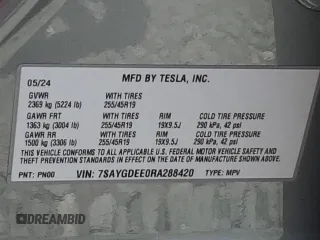 2024 Tesla Model Y Long Range with VIN 7SAYGDEE0RA288420, listed as a Copart auction lot 59159015 with 7,831 mi miles and Salvage title. Bid and sale history available at DreamBid. Image 12.