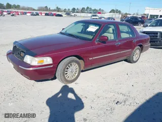 2006 Mercury Grand Marquis LS Premium with VIN 2MEFM75V06X622375, listed as a IAAI auction lot 41686035 with 165,495 mi miles. Bid and sale history available at carsss.com. Image 2.