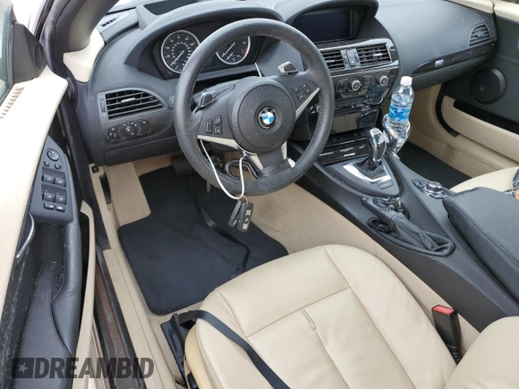 2009 BMW 6 Series 650i with VIN WBAEB53599CX64829, listed as a Copart auction lot 75694824 with 0 mi miles and Salvage Title. Bid and sale history available at carsss.com. Image 8.