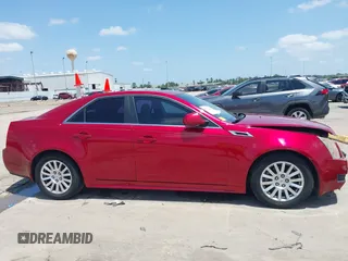 2012 Cadillac CTS Luxury с VIN 1G6DE5E52C0109345, выставлен на аукционе IAAI как лот 42129624 с пробегом 137 412 миль миль и . История ставок и продаж доступна на DreamBid. Изображение 13.