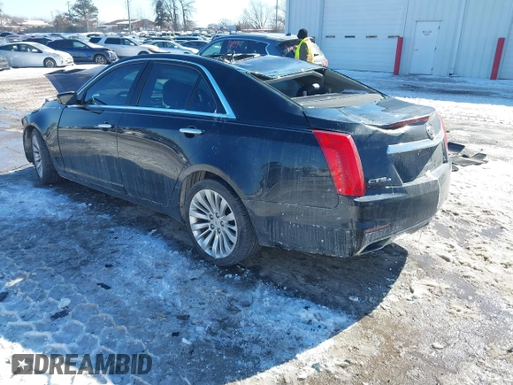2014 Cadillac CTS Luxury AWD with VIN 1G6AX5SX3E0191673, listed as a IAAI auction lot 41617087 with 68,581 mi miles and . Bid and sale history available at DreamBid. Image 3.