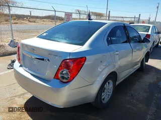 2014 Chevrolet Sonic LT with VIN 1G1JC5SH5E4178314, listed as a IAAI auction lot 41657818 with 139,959 mi miles and . Bid and sale history available at DreamBid. Image 4.