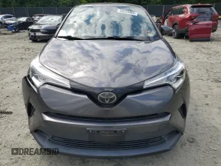 2018 Toyota C-HR XLE z VIN JTNKHMBX2J1003394, wystawiony jako Copart lot #58234865 z przebiegiem 132 574 mil mil oraz Szkoda całkowita • Salvage title. Historia ofert i sprzedaży dostępna na DreamBid. Obrazek 5.