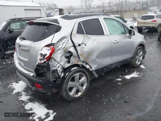 2016 Buick Encore Leather with VIN KL4CJGSB9GB599751, listed as a IAAI auction lot 41150011 with 91,200 mi miles. Bid and sale history available at carsss.com. Image 4.
