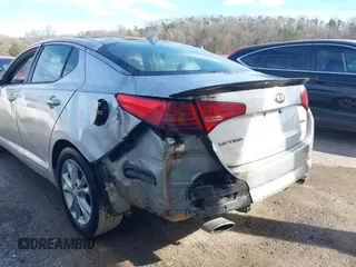 2013 Kia Optima EX with VIN 5XXGN4A77DG173344, listed as a IAAI auction lot 41830904 with 174,655 mi miles. Bid and sale history available at carsss.com. Image 6.