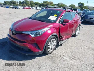 2019 Toyota C-HR XLE with VIN JTNKHMBX5K1044846, listed as a IAAI auction lot 41670614 with 52,374 mi miles. Bid and sale history available at carsss.com. Image 2.