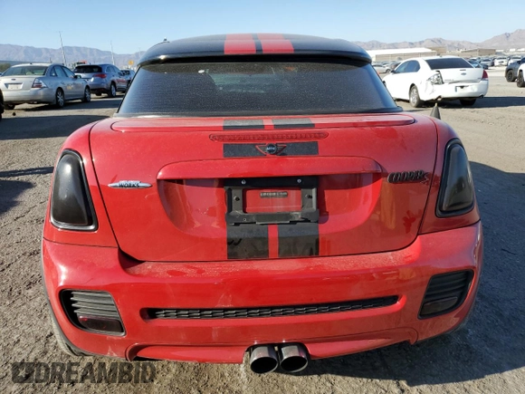 2015 MINI Coupe S z VIN WMWSX3C59FT409468, wystawiony jako Copart lot #71401384 z przebiegiem Nie podano mil oraz Szkoda całkowita • Salvage title. Historia ofert i sprzedaży dostępna na DreamBid. Obrazek 6.