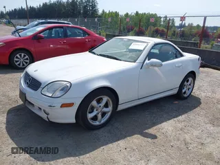 2001 Mercedes-Benz SLK-Class with VIN WDBKK65F31F172555, listed as a IAAI auction lot 42056347 with 197,272 mi miles. Bid and sale history available at carsss.com. Image 2.
