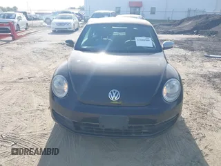 2013 Volkswagen Beetle 2.5L with VIN 3VWJP7AT1DM608370, listed as a IAAI auction lot 42088900 with Not Provided miles and . Bid and sale history available at DreamBid. Image 6.