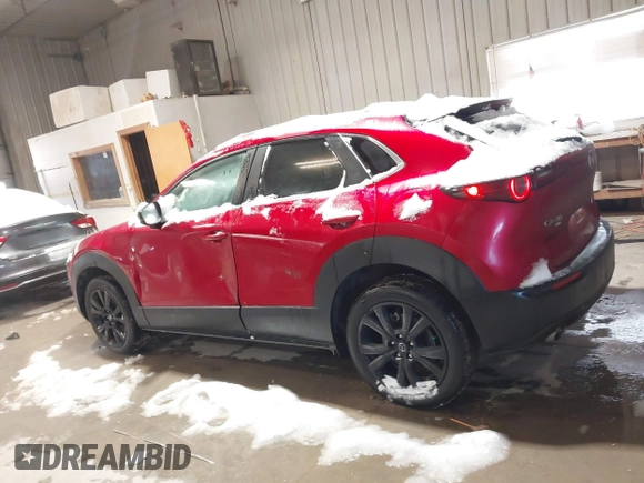 2022 Mazda CX-30 2.5 Turbo with VIN 3MVDMBAY5NM427943, listed as a IAAI auction lot 41585519 with 32,807 mi miles and . Bid and sale history available at DreamBid. Image 14.