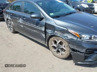 2019 Kia Forte LXS z VIN 3KPF24AD4KE081480, wystawiony jako IAAI lot #42073063 z przebiegiem 100 605 mil mil oraz . Historia ofert i sprzedaży dostępna na DreamBid. Obrazek 6.