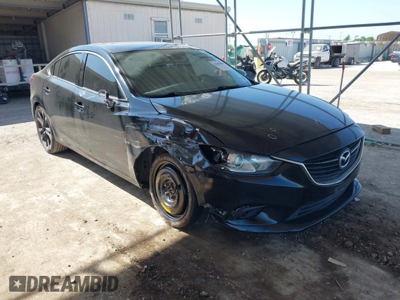2015 Mazda 6 i Grand Touring with VIN JM1GJ1W59F1179548, listed as a IAAI auction lot 42004860 with 153,532 mi miles and . Bid and sale history available at DreamBid. Image 1.