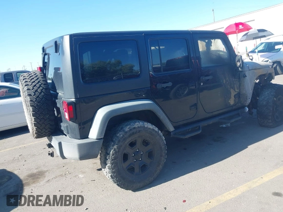 2011 Jeep Wrangler Unlimited Rubicon with VIN 1J4BA6H16BL615945, listed as a IAAI auction lot 42159418 with Not provided miles and . Bid and sale history available at DreamBid. Image 4.