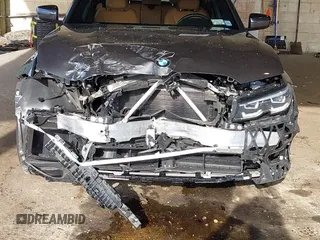 2021 BMW 3 Series 330i xDrive z VIN 3MW5R7J03M8B87133, wystawiony jako IAAI lot #42005842 z przebiegiem 28 668 mil mil oraz . Historia ofert i sprzedaży dostępna na DreamBid. Obrazek 6.