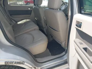 2009 Mercury Mariner Premier z VIN 4M2CU97779KJ00665, wystawiony jako IAAI lot #42698060 z przebiegiem 162 205 mil mil oraz . Historia ofert i sprzedaży dostępna na DreamBid. Obrazek 8.