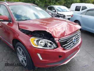 2015 Volvo XC60 T6 with VIN YV4902RKXF2669393, listed as a IAAI auction lot 42380410 with 124,258 mi miles and . Bid and sale history available at DreamBid. Image 6.
