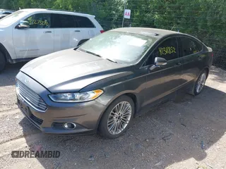 2015 Ford Fusion SE z VIN 3FA6P0H98FR275848, wystawiony jako IAAI lot #42311852 z przebiegiem 197 536 mil mil oraz . Historia ofert i sprzedaży dostępna na DreamBid. Obrazek 2.