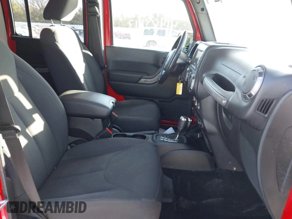 2018 Jeep Wrangler JK Unlimited Sport with VIN 1C4BJWDG9JL874850, listed as a IAAI auction lot 41482613 with 80,669 mi miles. Bid and sale history available at carsss.com. Image 5.