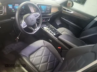 2024 Volkswagen Atlas SE with VIN 1V2HR2CAXRC564175, listed as a IAAI auction lot 42731227 with 14,479 mi miles and . Bid and sale history available at DreamBid. Image 9.
