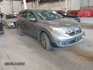 2018 Honda CR-V EX-L z VIN 2HKRW2H87JH657135, wystawiony jako IAAI lot #42193245 z przebiegiem 104 171 mil mil oraz . Historia ofert i sprzedaży dostępna na DreamBid. Obrazek 1.