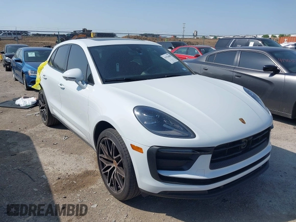 2023 Porsche Macan with VIN WP1AA2A57PLB21266, listed as a IAAI auction lot 41916488 with 15,179 mi miles. Bid and sale history available at carsss.com. Image 1.