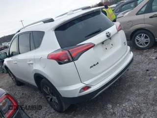 2018 Toyota RAV4 XLE with VIN JTMRFREV8JJ225065, listed as a IAAI auction lot 41940678 with 145,074 mi miles. Bid and sale history available at carsss.com. Image 3.