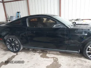 2012 Ford Mustang V6 Premium with VIN 1ZVBP8AM5C5223787, listed as a IAAI auction lot 42141944 with 73,960 mi miles. Bid and sale history available at carsss.com. Image 13.