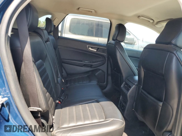 2020 Ford Edge SEL с VIN 2FMPK3J9XLBA59093, выставлен на аукционе Copart как лот 52542645 с пробегом 128 059 миль миль и Чистый • Clean title. История ставок и продаж доступна на DreamBid. Изображение 11.