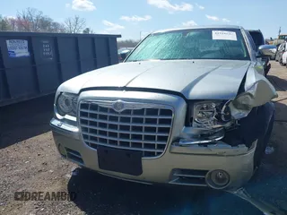 2006 Chrysler 300 C with VIN 2C3LA63H06H105774, listed as a IAAI auction lot 41918634 with 319,232 mi miles. Bid and sale history available at carsss.com. Image 12.
