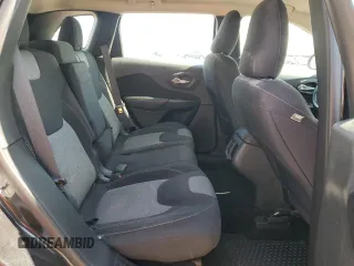 2015 Jeep Cherokee Sport with VIN 1C4PJMAB7FW773265, listed as a Copart auction lot 61134045 with 117,628 mi miles and Salvage title. Bid and sale history available at DreamBid. Image 11.