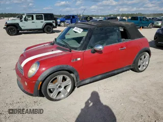 2005 MINI Convertible S with VIN WMWRH33505TF83975, listed as a Copart auction lot 79057244 with 68,019 mi miles and Clean Title. Bid and sale history available at DreamBid. Image 1.