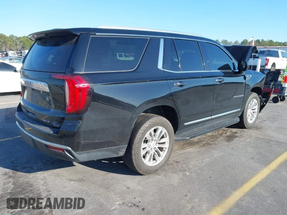 2021 GMC Yukon SLT with VIN 1GKS1BKD0MR199154, listed as a IAAI auction lot 41654239 with 105,357 mi miles. Bid and sale history available at carsss.com. Image 4.