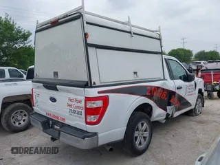 2021 Ford F-150 XL with VIN 1FTMF1CB7MKE81507, listed as a IAAI auction lot 41903595 with 71,860 mi miles and . Bid and sale history available at DreamBid. Image 4.