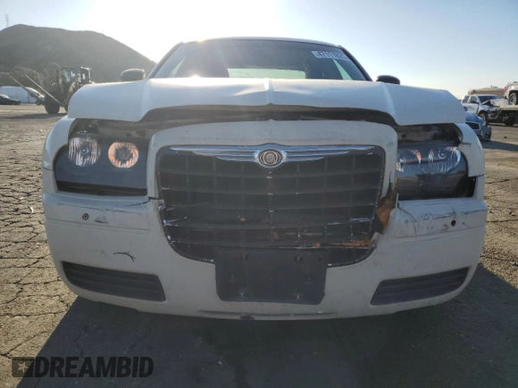 2007 Chrysler 300 with VIN 2C3KA43R77H732806, listed as a Copart auction lot 47111825 with 104,639 mi miles and Salvage Title. Bid and sale history available at DreamBid. Image 5.