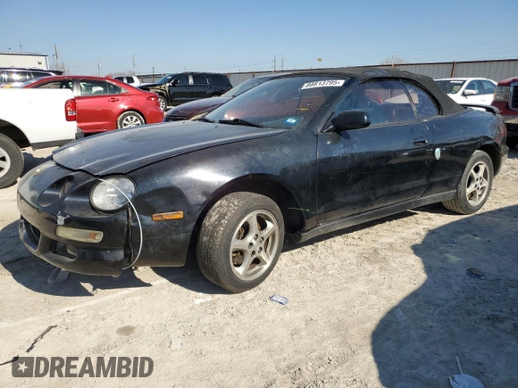 1998 Toyota Celica GT z VIN JT5FG02T2W0049461, wystawiony jako Copart lot #88813795 z przebiegiem 191 123 mil mil oraz Czysty tytuł • Clean title. Historia ofert i sprzedaży dostępna na DreamBid. Obrazek 1.