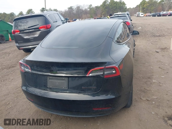 2023 Tesla Model 3 Long Range with VIN 5YJ3E1EB6PF673532, listed as a IAAI auction lot 41885716 with 39,690 mi miles and . Bid and sale history available at DreamBid. Image 16.