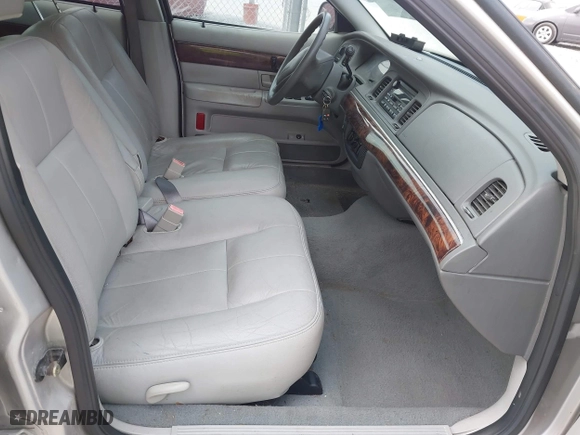 2004 Mercury Grand Marquis GS with VIN 2MEFM74W04X669087, listed as a IAAI auction lot 42090394 with 172,008 mi miles. Bid and sale history available at carsss.com. Image 5.