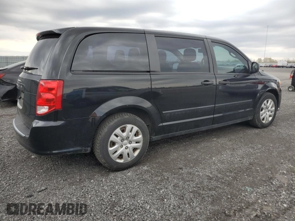 2015 Dodge Grand Caravan SE with VIN 2C4RDGBGXFR744203, listed as a Copart auction lot 54791795 with 216,594 mi miles and Clean Title. Bid and sale history available at DreamBid. Image 3.